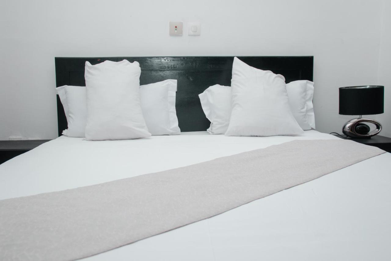 Hotel Djigui Абиджан Екстериор снимка